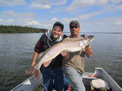 (Guide Jerry) holding S. Gogots Trophy pike 