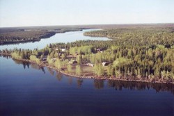 Lodge with the Little Churchill River in background.